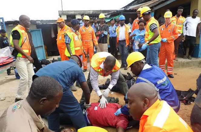 NEMA officials conducting rescue efforts at the scene of the crash