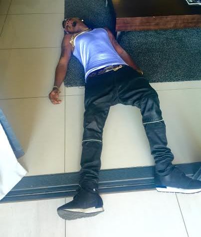 The photo of Skiibii collapsed on his living room floor that went viral. Skiibii is wearing the exact same clothes he wore in the previous photo posted 2 weeks before, and at the same location