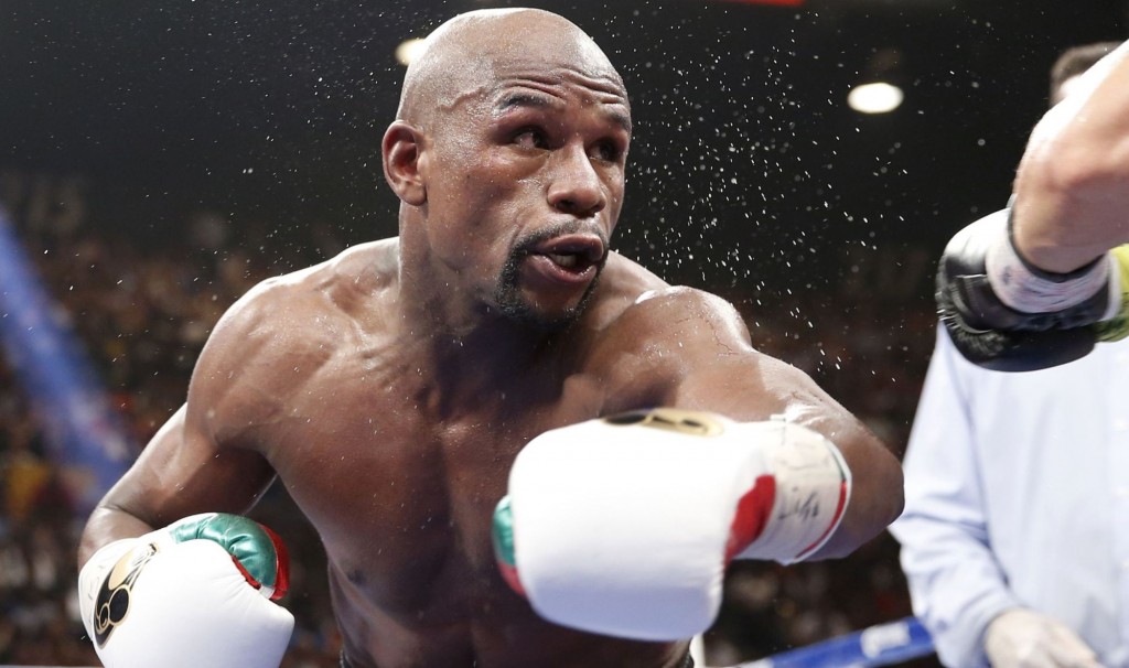 Floyd Mayweather Jr. is seen in his WBC-WBA welterweight title boxing fight against Marcos Maidana Saturday, May 3, 2014, in Las Vegas. (AP Photo/Eric Jamison)