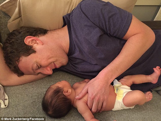Zuckerberg changes Max’s diaper for the first time. (Facebook) 