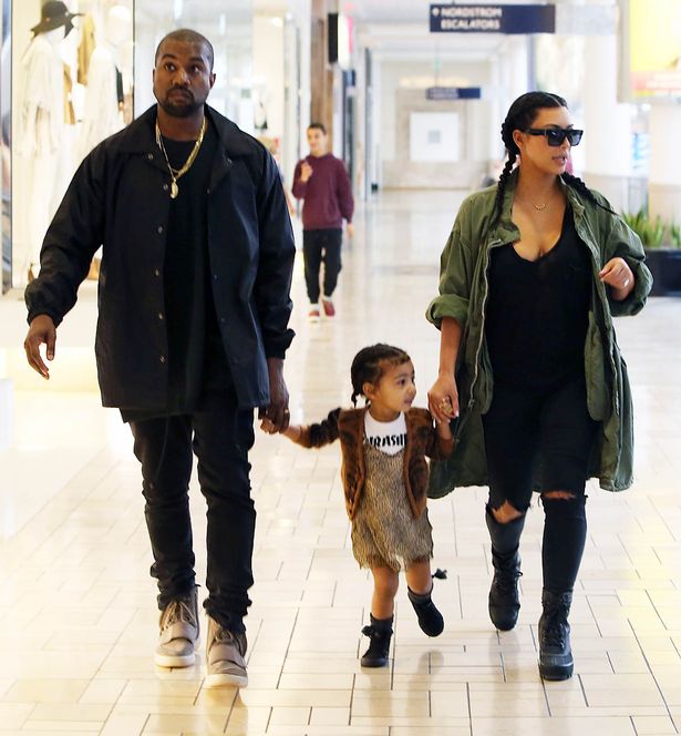Kim-Kardashian-and-Kanye-West-with-daughter-North