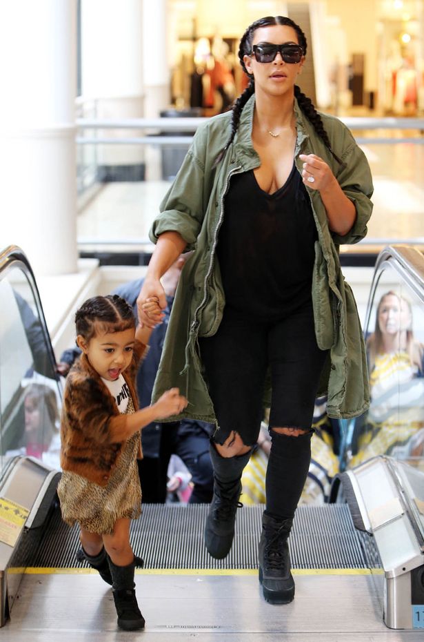 Kim-Kardashian-and-Kanye-West-with-daughter-North2