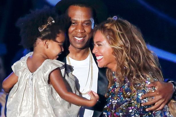 Beyonce-smiles-with-Jay-Z-and-daughter-Ivy-Blue1`