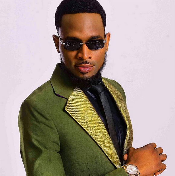Video: Fan Gets Overly Excited At Gidi Fest & Licks D’banj’s Chest