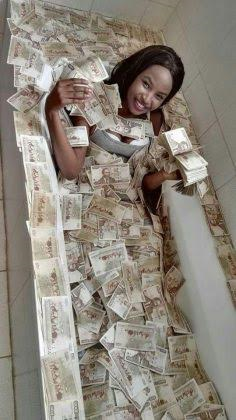 Lisa Martinez stacks of cash1