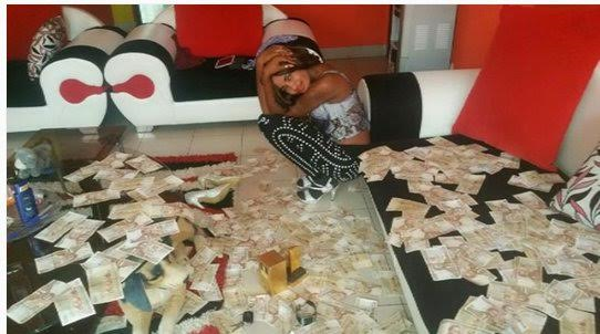 Lisa Martinez stacks of cash10