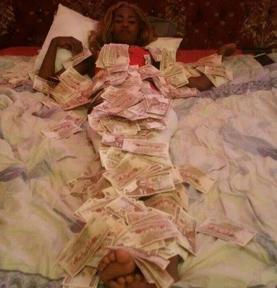 Lisa Martinez stacks of cash3