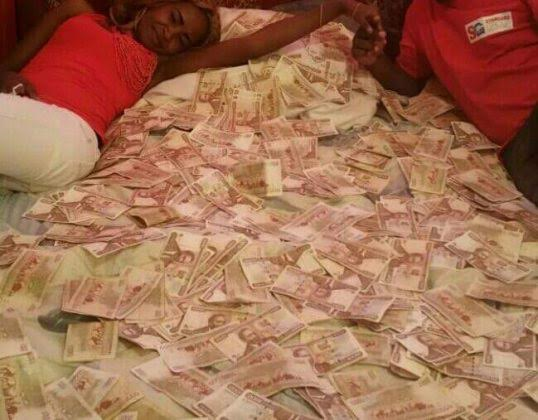 Lisa Martinez stacks of cash5