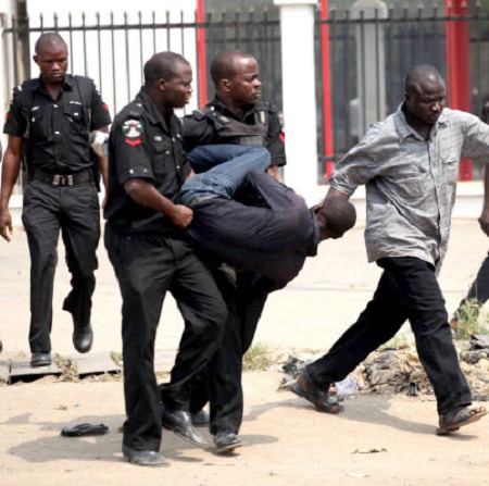 police-dragging-man-away-ii