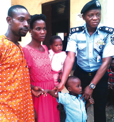 abia-cp-adeleye-oyebade-handing-over-rescued-boy-to-his-mother