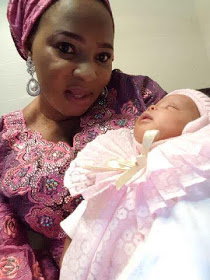 Moji Olaiya Carrying New Born Baby Girl