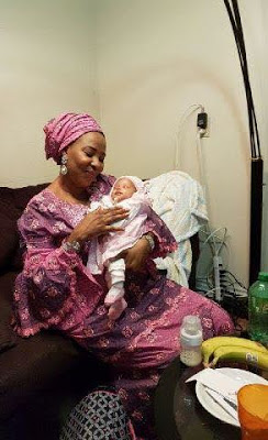 Moji Olaiya Carrying New Born Baby Girl