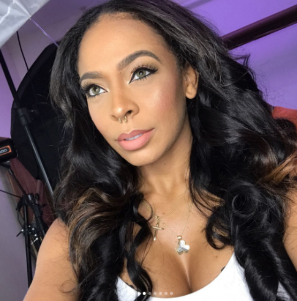 tboss shows off pierced tongue