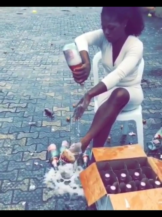 Slay queen pops 100 bottles
