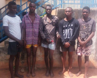 police parade suspected armed robbers