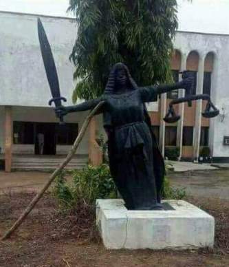 Fallen Justice Statue