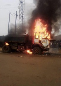 truck crushed 9 set ablaze