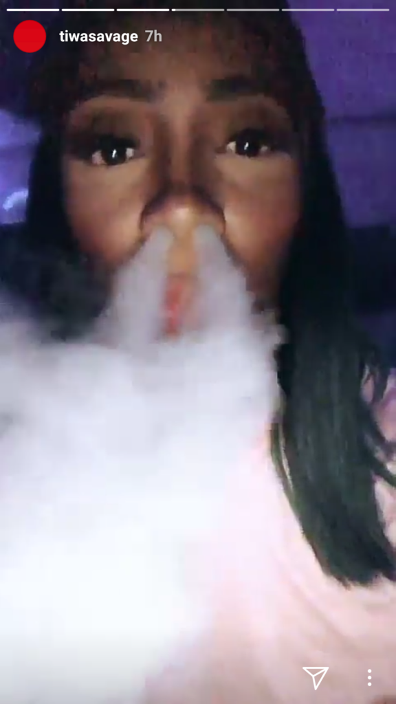 Tiwa Savage smokes shisha