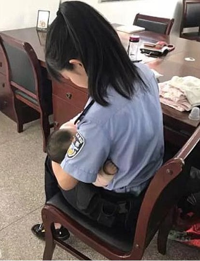Policewoman breastfeed suspect's hungry baby