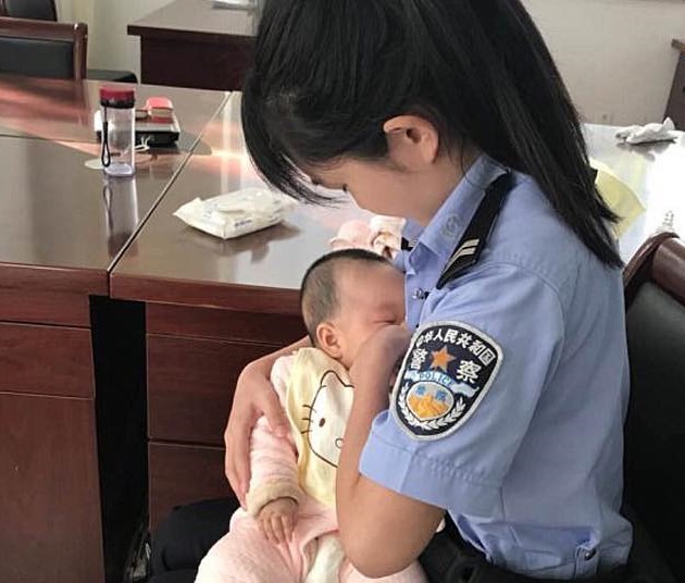 Policewoman breastfeed suspect's hungry baby