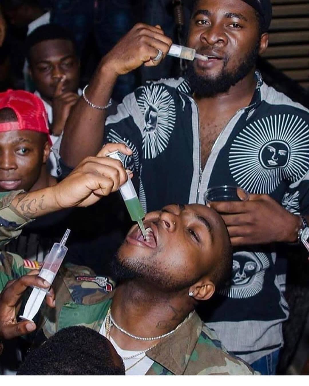 Davido Pictured Drinking