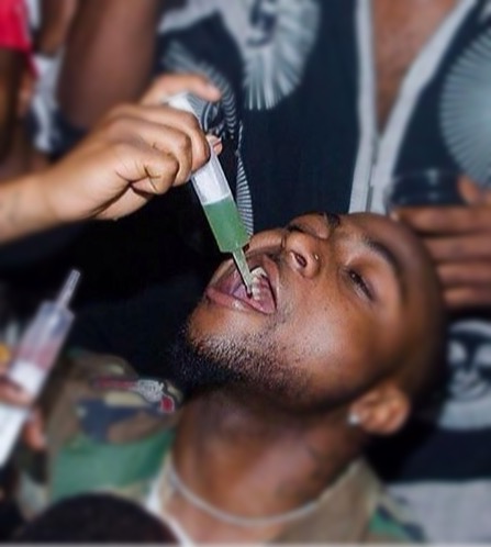 Davido Pictured Drinking