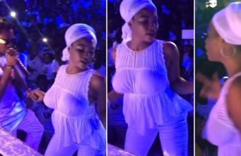 Busty lady without bra dances
