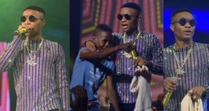 Wizkid signs 12 year old boy