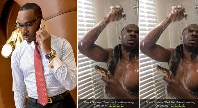 Pretty mike bathes python named Toke Makinwa