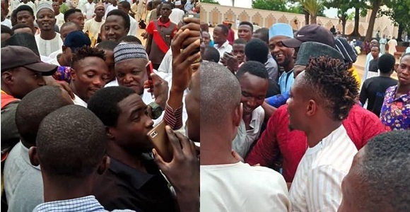 Football fans mob Ahmed Musa