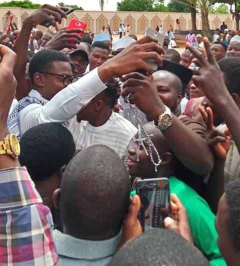 Football fans mob Ahmed Musa
