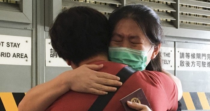 Tears of joy as Chinese woman tricked by Nigerian boyfriend into carrying drugs is found not guilty after three years in jail (Photos)