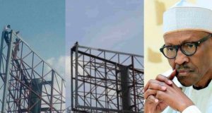 Man climbs billboard