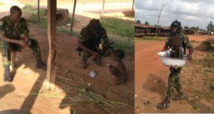 Troops rescues a malnourished child