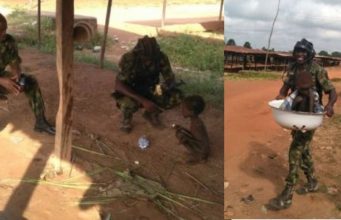 Troops rescues a malnourished child