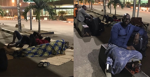 Travelers sleep by roadside