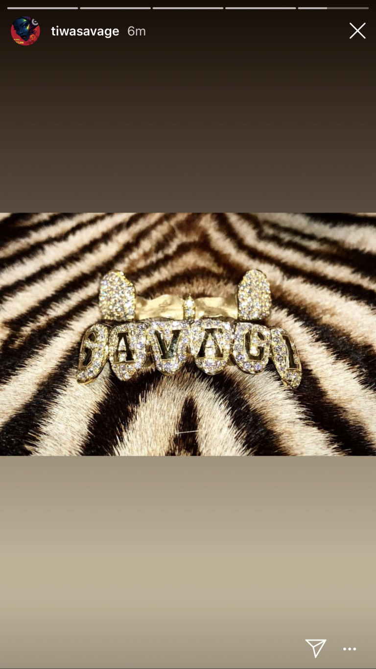 Tiwa Savage flaunts diamond grills