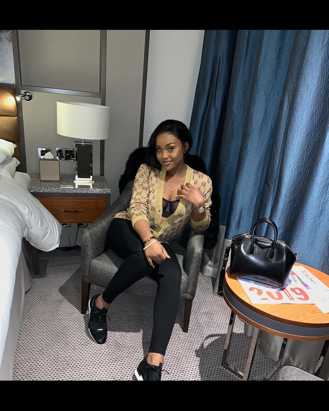 Chioma bares cleavage