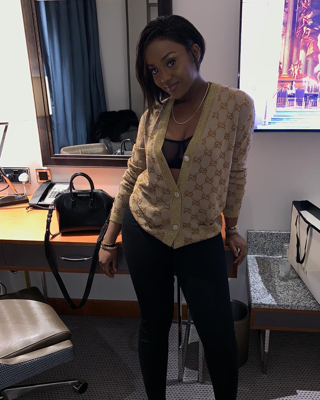 Chioma bares cleavage