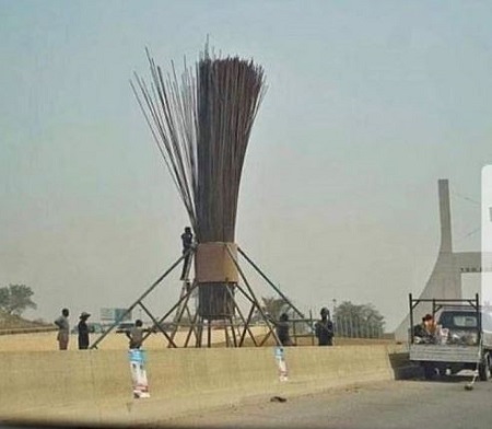 APC erects giant broom at Abuja city gate