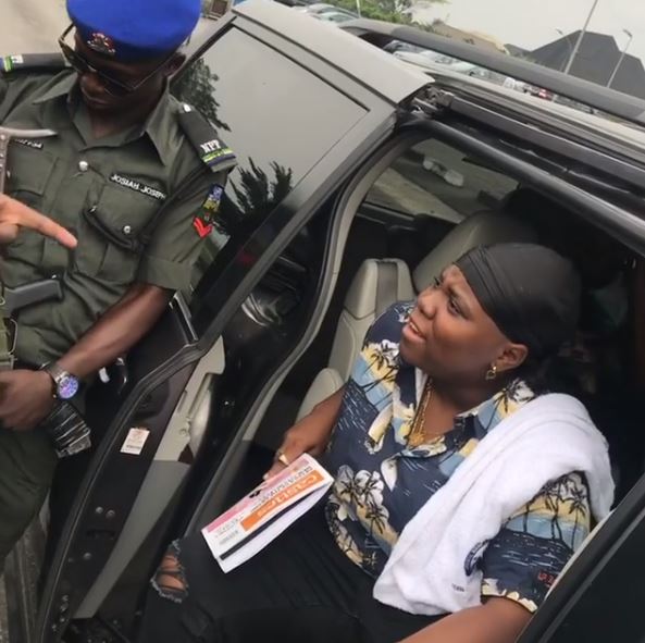 Police confront Singer Teni