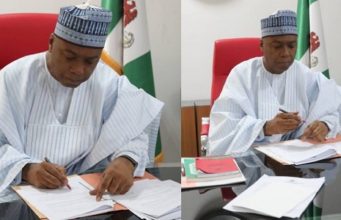Bukola Saraki signs National Minimum Wage Bill
