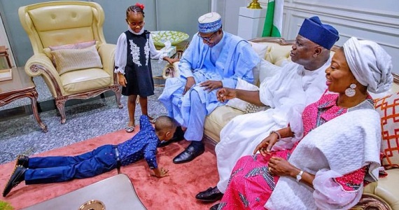 Ambode son prostrates to welcome the president