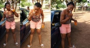 Nigerian Lady Brushes teeth