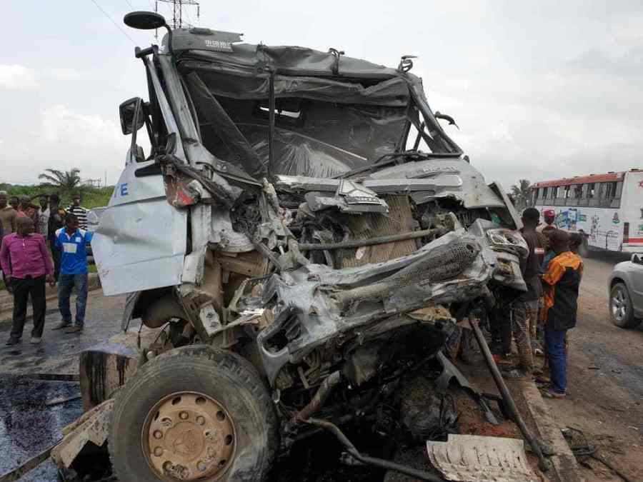 Dangote truck crashes