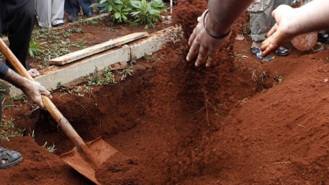 Kenyan officials exhume dead