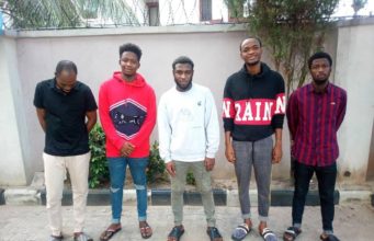 Suspected Yahoo boys all smiles