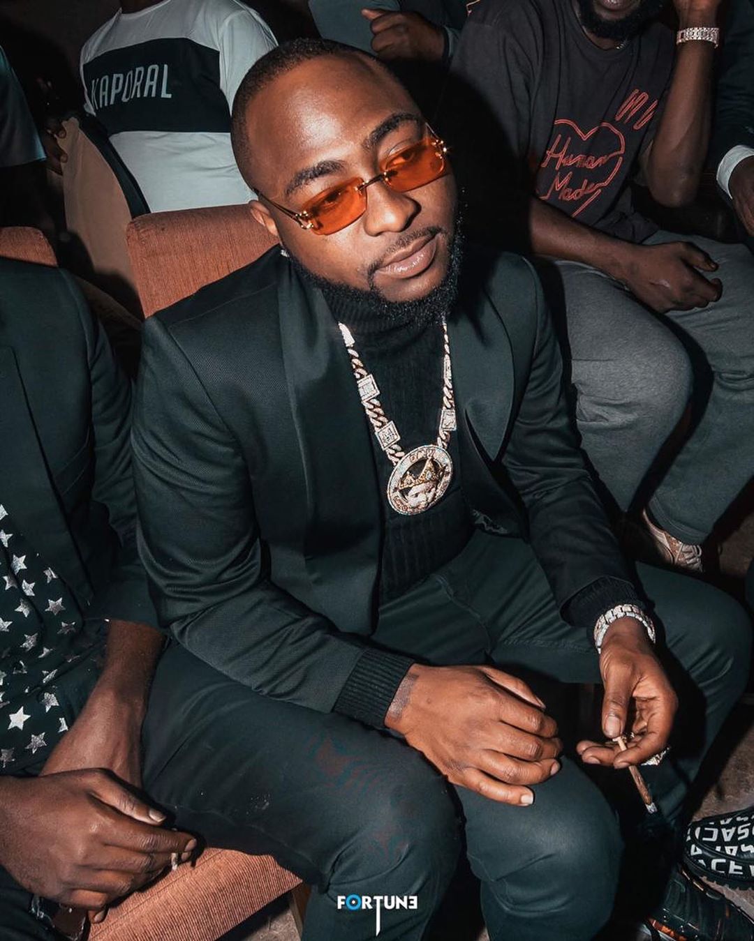 Davido signs