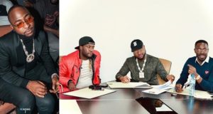 Davido signs