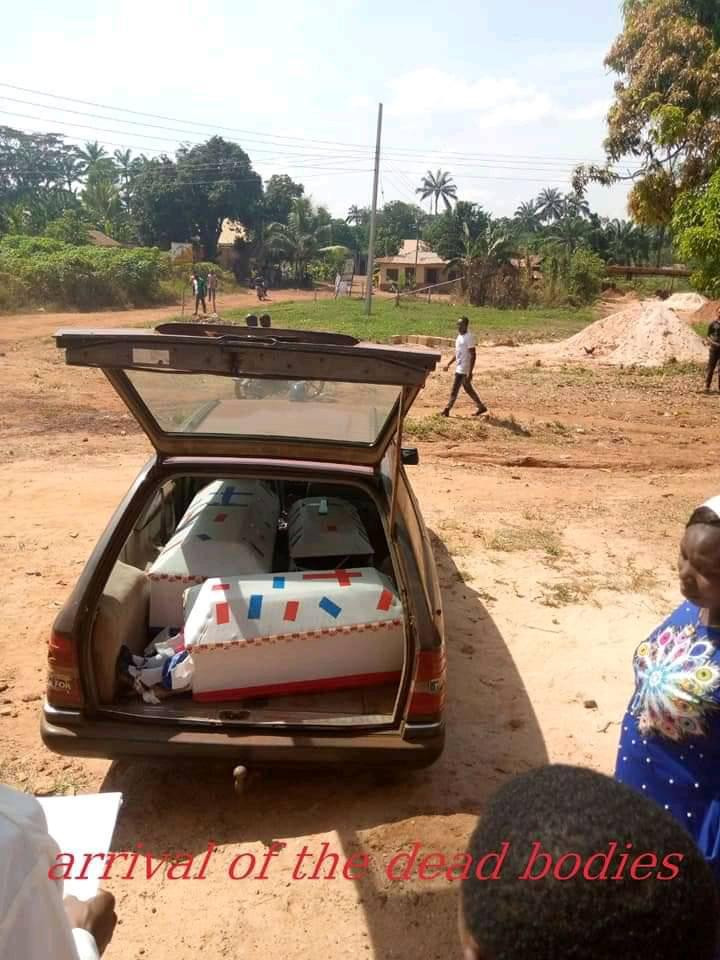Photos from the burial of three children found dead inside a car in Enugu